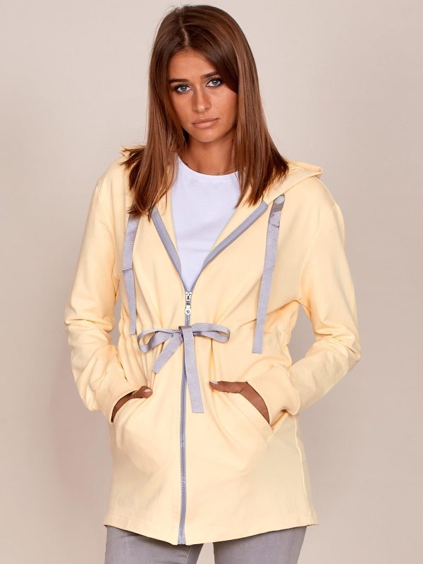 Velkoobchod Světle zlutá delší mikina s žebrovanou opaskem a mikinou